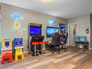Your very own Game Room area with foosball, arcade games, and a gaming console!