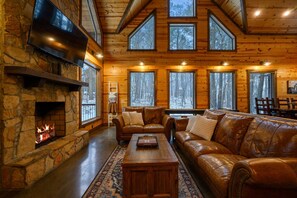 Get cozy by the living room fireplace & stream your favorites on the smart TV