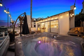 Relax and recharge in the private hot tub