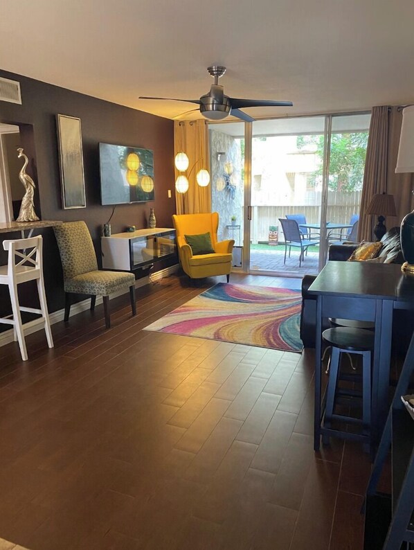 Welcome to the heart of our stylish retreat! Our living room exudes comfort and modern charm, featuring plush furnishings and contemporary decor. 
