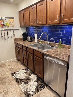 Unleash your culinary creativity in our fully-equipped kitchen. 