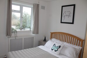 Bedroom 2:
Double bed with ample wardrobe storage.