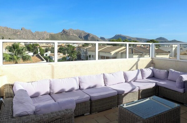 Top floor roof terrace and seating area.