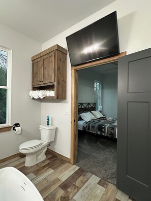 Master bathroom has a soaking tub and tv to just relax. 
