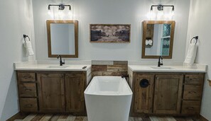 Master bathroom has a soaking tub and tv to just relax. 
