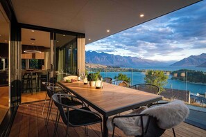 Alfresco Living with Stunning Views and BBQ
The outdoor area features a BBQ and gas fireplace, offering a perfect spot for dining and enjoying Queenstown's breathtaking scenery.