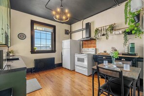 A cozy, well-equipped kitchen with all the essentials, making it easy to whip up meals in a compact yet functional space!