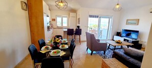 Open plan kitchen with dining/living area