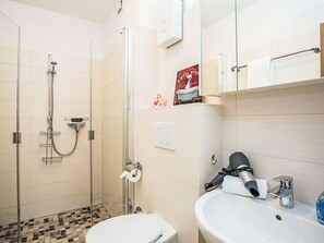 Bathroom, Plumbing Fixture, Interior Design, Flooring, Toilet, Floor, Toilet Seat, Bathroom Sink, Plumbing, Tap