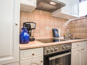 Kitchen Appliance, Kitchen, Countertop, Cabinetry, Major Appliance, Home Appliance, Interior Design, Kitchen Stove, Stove, Small Appliance