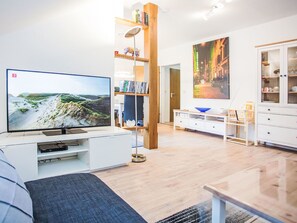 Furniture, Interior Design, Flooring, Television, Television Set, Wood, Floor, Living Room, Electronic Device, Shelving