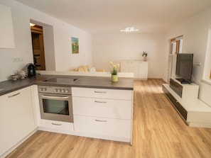 Flooring, Furniture, Interior Design, Floor, Wood Flooring, Wood, Cabinetry, Countertop, Laminate Flooring, Kitchen