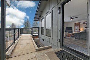 Wheelchair accommodating home with additional entrance with ramp entry for a seamless and convenient stay.
