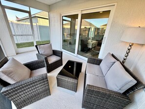 Screened-in Lanai Overlooking Private, Enclosed Backyard