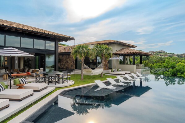 Las Casitas is a remarkable beachfront property located in the exclusive Kupuri community of Punta Mita, featuring three separate casitas.