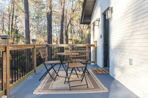 Outdoor patio balcony with conversation table seating for 2