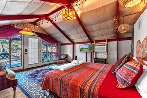 Snuggle up in the King size bed and watch the sunrise from the large front windows