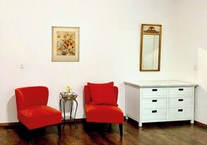 The spacious master bedroom has its own seating area.
