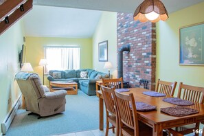 Living area has a 47-inch Flat Screen TV with DVD player.  Dining area seats 6.