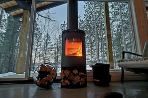 A high-efficiency Danish Morso wood stove keeps the cabin cozy in all seasons