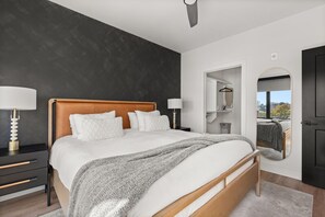 King size bed in the primary bedroom, with Smart TV , and HuluLive, on us!