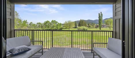 Step outside to the enchanting views from the living room and patio.