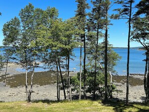 Gorgeous ocean breezes + views overlooking Hart Island with distant bridge views