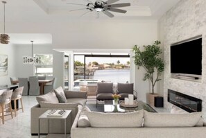 Large Living Room (2 Full Couches + 2 Chairs), Fireplace & TV (with Sound Bar & Sub)