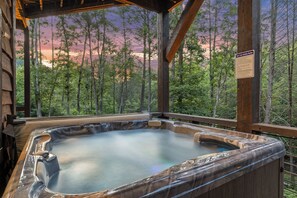 The bubbling hot tub offers a relaxing escape, perfect for unwinding under the stars.