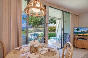 Well-lit dining space for four people.