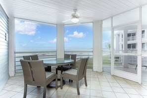 Screened Lanai with outdoor dining table