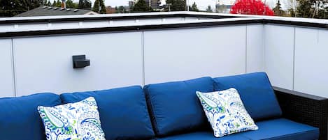Private rooftop deck with views of the Puget Sound.