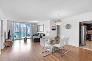 Beach Getaway: Modern 2BR Condo Pool & Gym Access (7603)