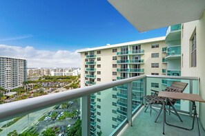 Beach Getaway: Modern 2BR Condo Pool & Gym Access (7624)