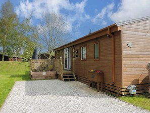 Back Of Large With Parking For Two Large Cars, Side Entrance To Lodge
