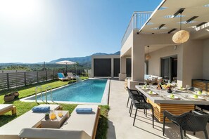 KS Alpha Villa(KS1) - Outdoor swimming pool with sunlougers and umbrellas