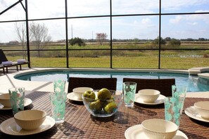 Experience the serene beauty of nature with stunning lake views right from the sunny pool deck. This peaceful outdoor space offers the perfect setting to relax and unwind.
