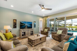 Step into the inviting family living room, a warm and comfortable space thoughtfully designed for relaxation, entertainment, and quality time with loved ones.