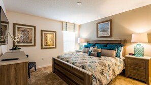 Master Suite 2 is a truly inviting and stylish haven, offering a perfect blend of elegance and comfort. This spacious suite is thoughtfully designed with a modern aesthetic, featuring a cozy yet luxurious atmosphere that encourages relaxation.
