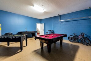 Step into the ultimate entertainment hub with a fully-equipped games room, perfect for both casual fun and friendly competition.