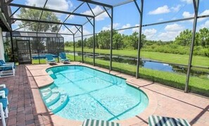Dive into relaxation at the outdoor resort-style pool, where stunning lake views set the perfect backdrop for a day of leisure.