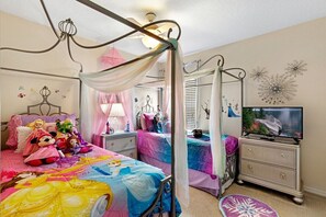 Princess Twin room with 2 Princess Twin beds, Nightstands with lights, 32ā flat screen TV, Ceiling fan