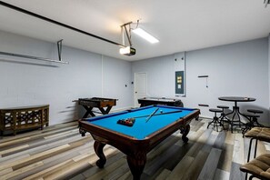 Welcome to the ultimate game room, a space designed to ignite fun, excitement, and friendly competition!