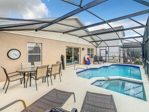 Soak up the Florida sun by your private screened-in pool and spa, located near Disney in beautiful Orlando — the perfect retreat after a day at the parks.
