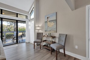 This beautifully appointed two-story villa accommodates up to 5 guests and boasts a spacious outdoor patio with stunning views of the George Fazio Golf Course.