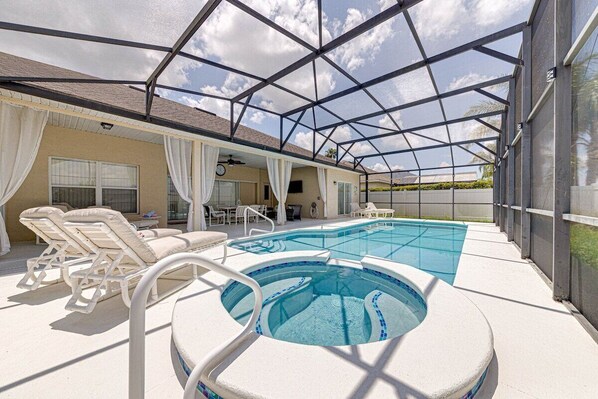 Imagine unwinding in a resort-style outdoor heated pool and spa under a blanket of stars, where relaxation meets luxury in an idyllic setting.
