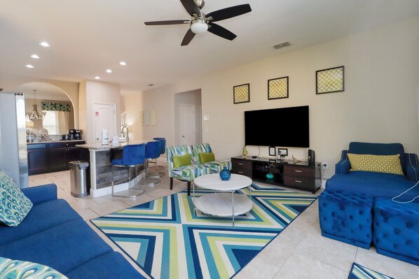 Step into comfort and style in this vibrant and spacious living area, located within Solterra Resort in Davenport County, Florida.