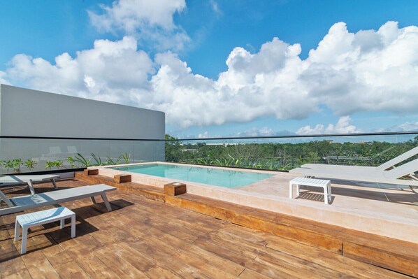 Stunning rooftop pool with expansive views of the surroundings.