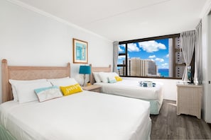 Relax in your bedroom with 2 queen-size beds