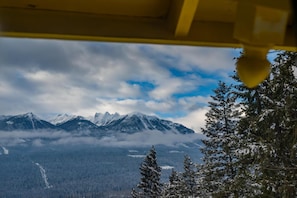 Expansive mountain views from the chalet's deck, inviting you to unwind and connect with nature.